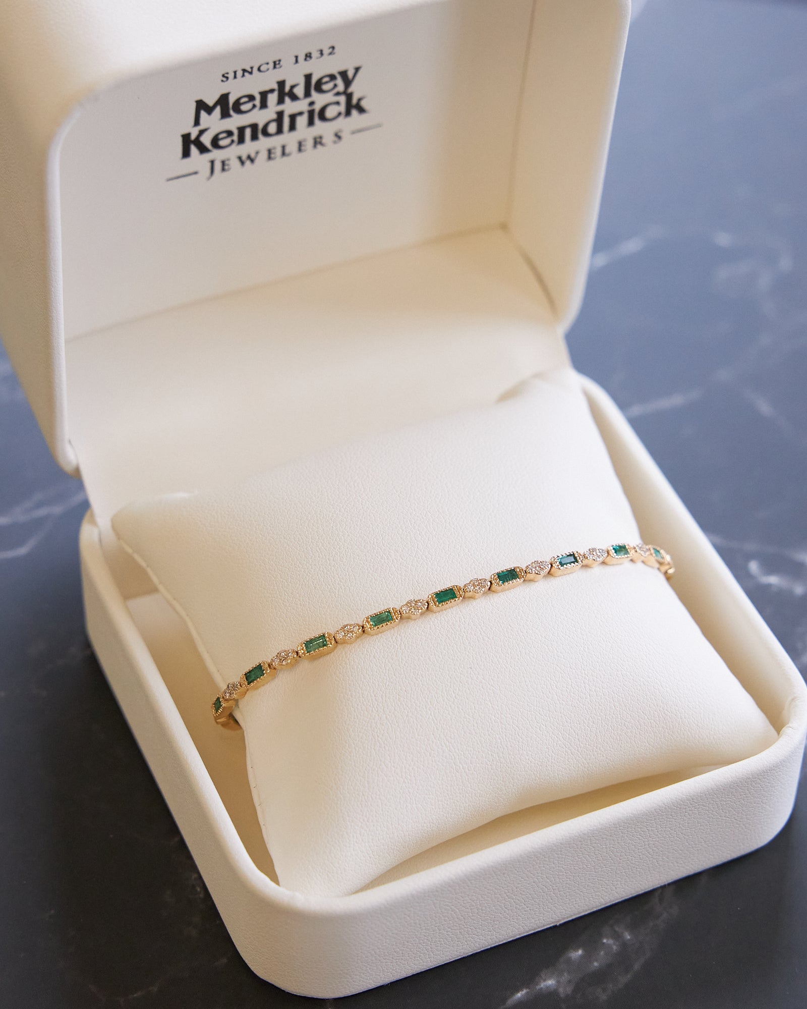 14 Karat Yellow Gold Emerald and Diamond Bracelet