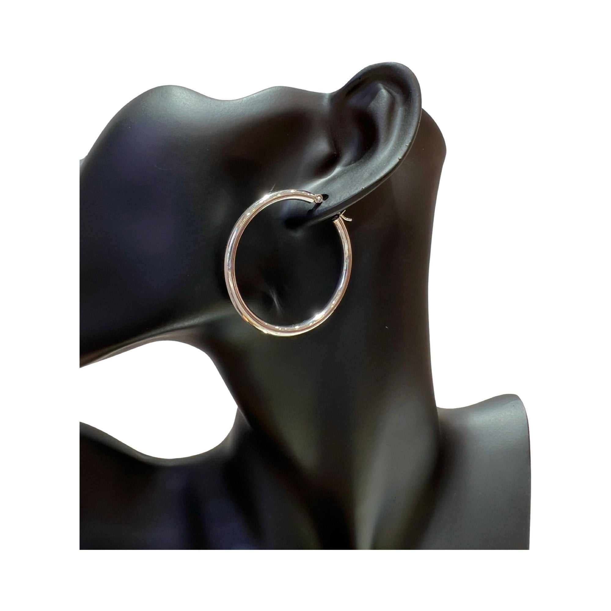 14 karat gold 3mm polished hoop earrings showcased on a mannequin's ear, perfect for any occasion.