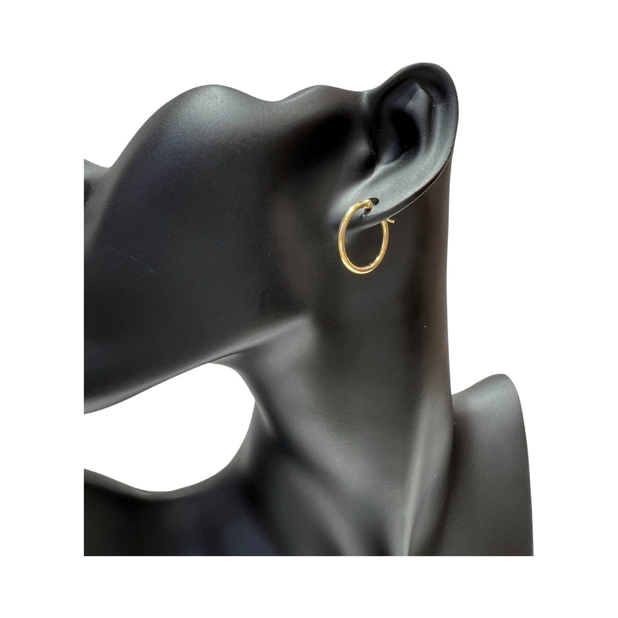 14 karat gold 2mm hoop earring displayed on a black mannequin, showcasing its classic design and high polished finish.