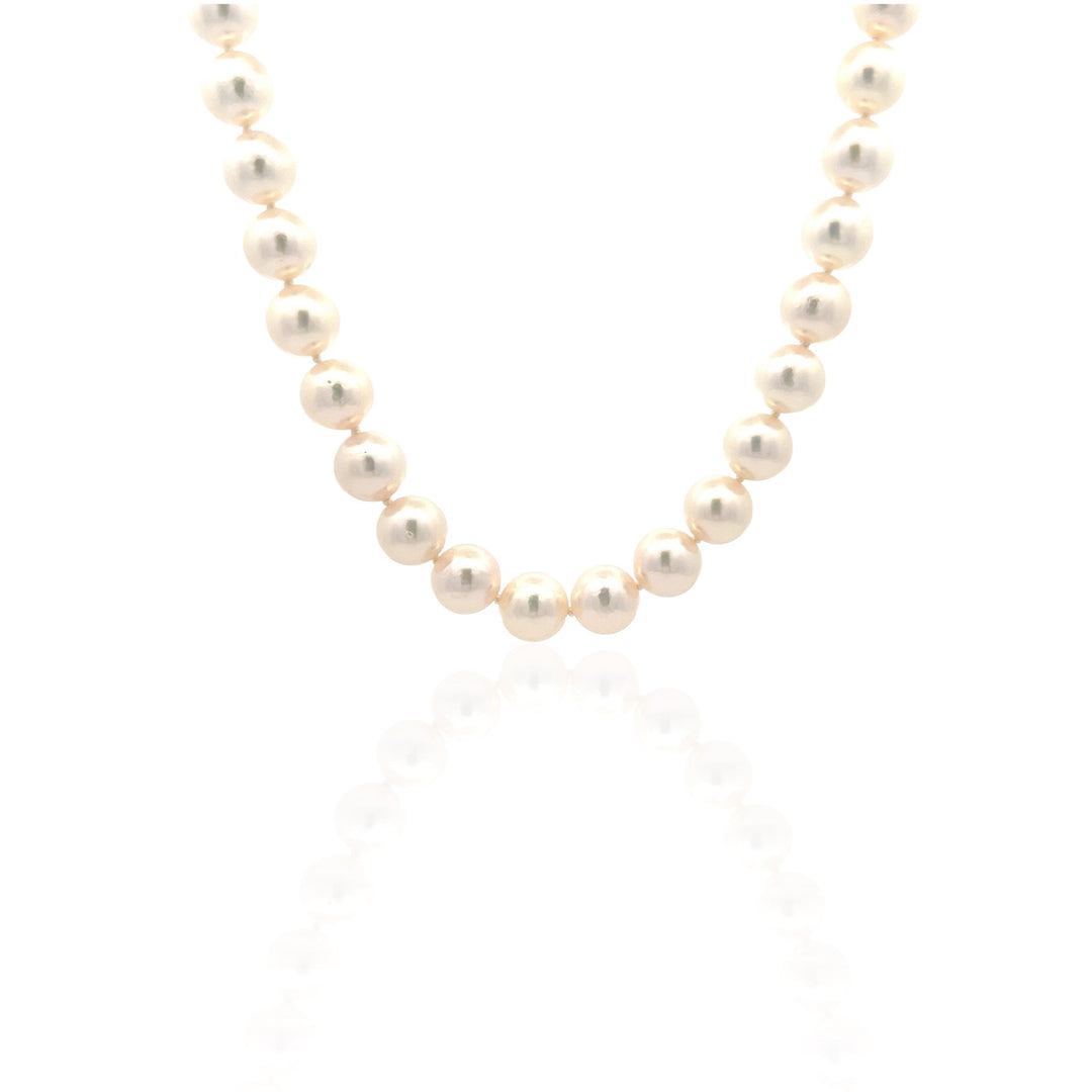 14 Karat White Gold and A Quality Pearl Necklace