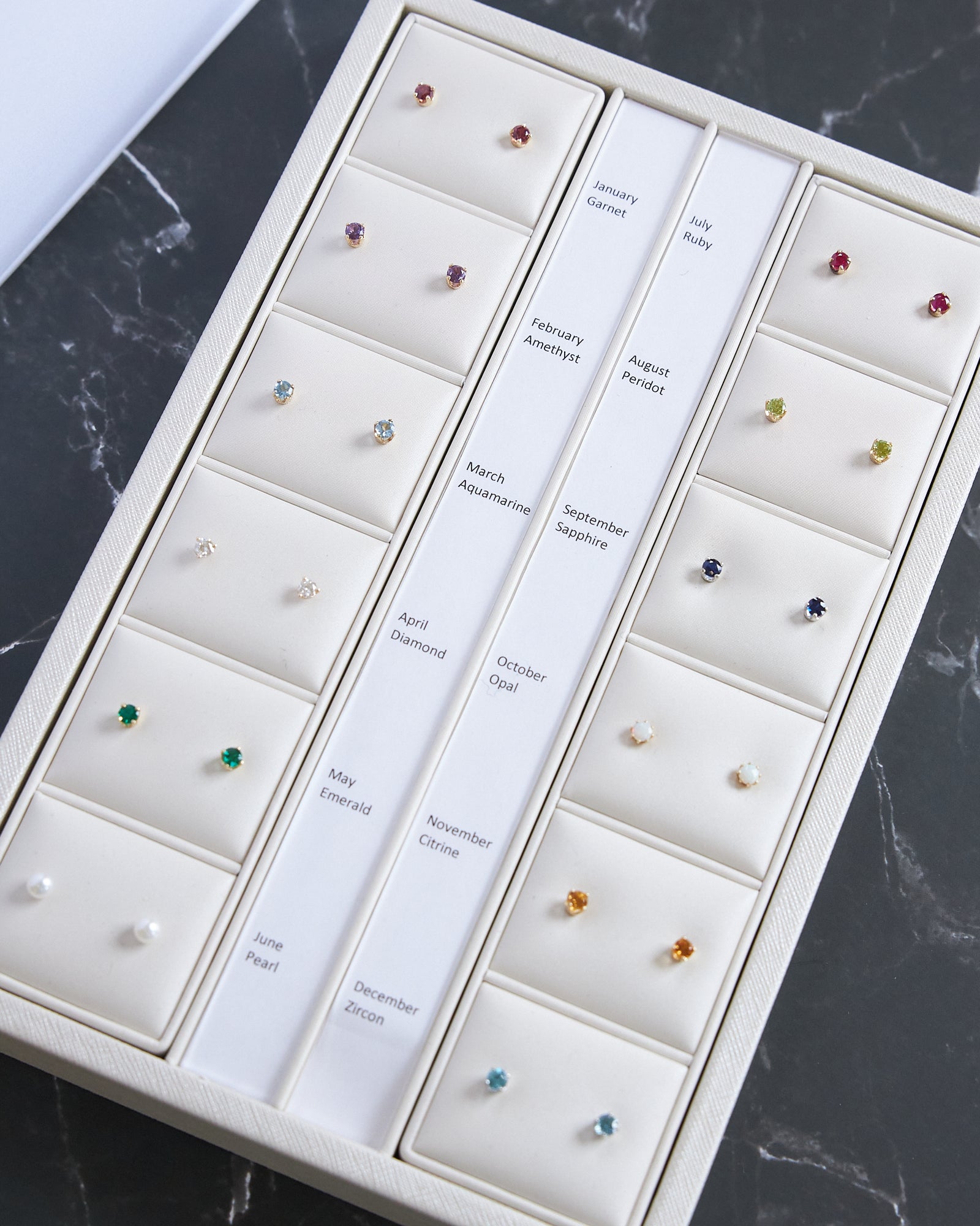 14 Karat White Gold Blue Zircon Earrings