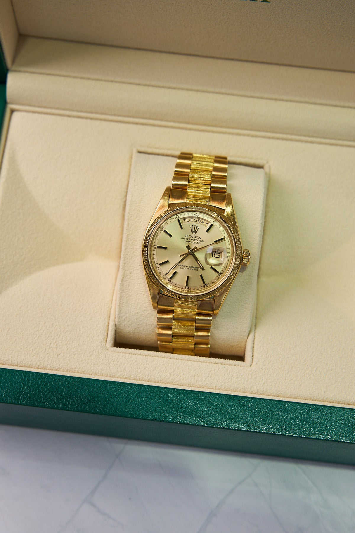 Pre-Owned Rolex Day-Date 36mm in 18K Yellow Gold, Bark Bezel – Ref. 1807 (1976)