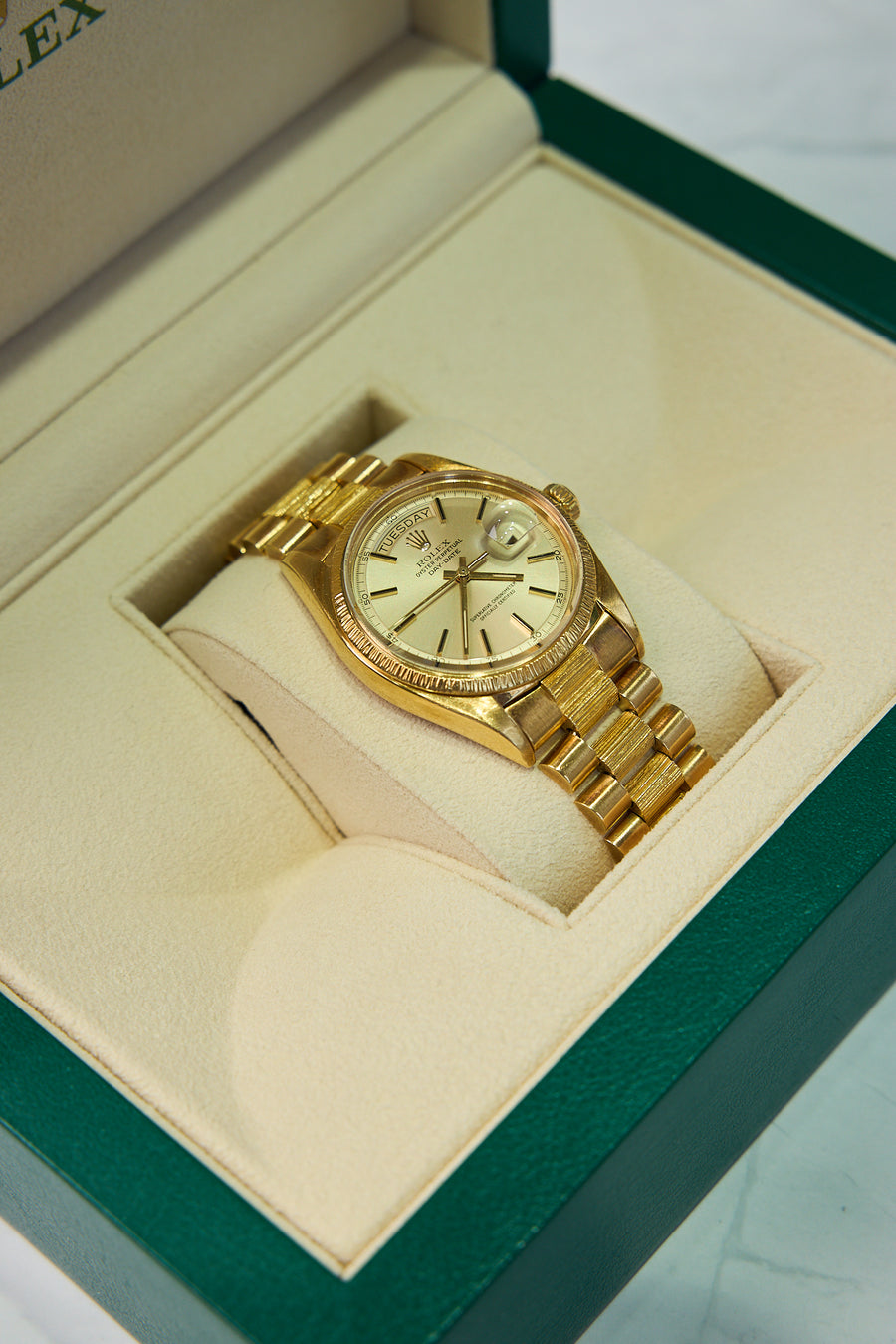 Pre-Owned Rolex Day-Date 36mm in 18K Yellow Gold, Bark Bezel – Ref. 1807 (1976)