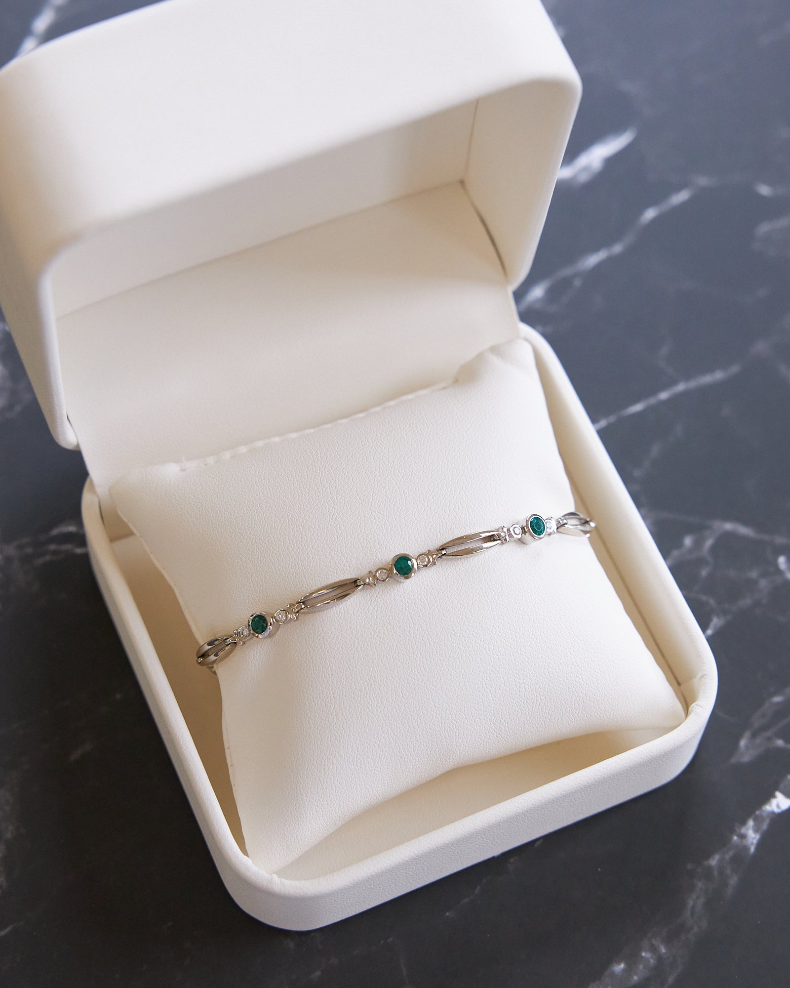 14 Karat White Gold Emerald and Diamond Bracelet