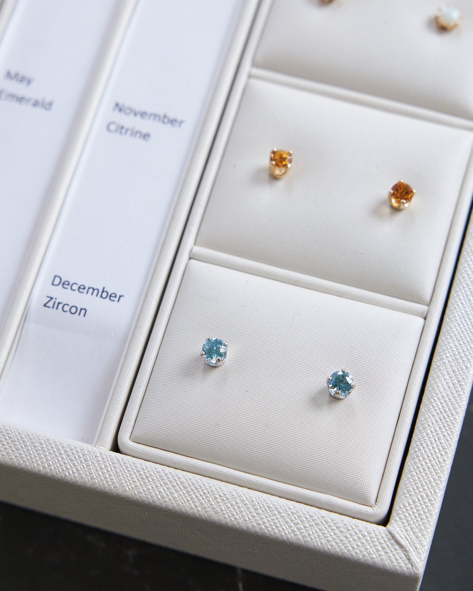 14 Karat White Gold Blue Zircon Earrings