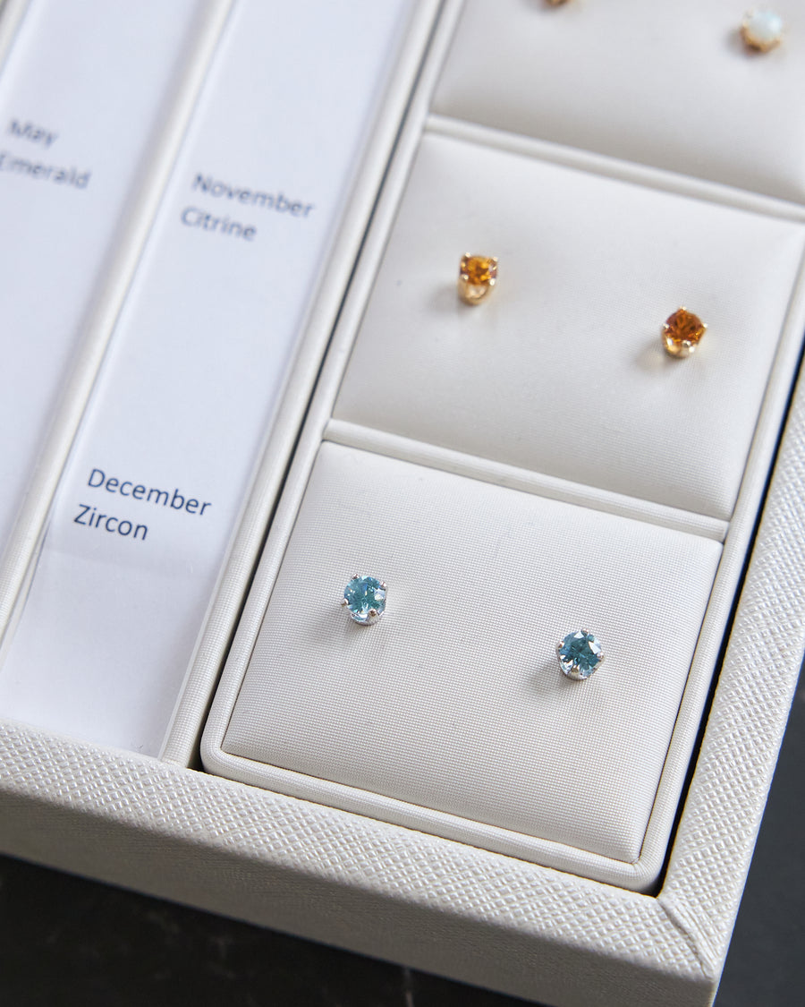 14 Karat White Gold Blue Zircon Earrings