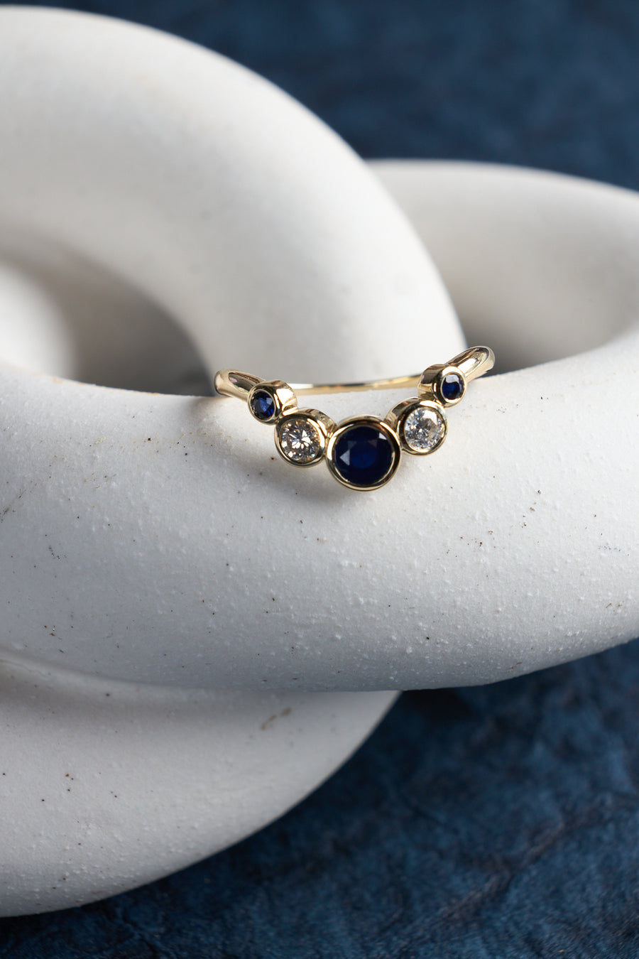 14 Karat Yellow Gold Sapphire and Diamond Curved Band